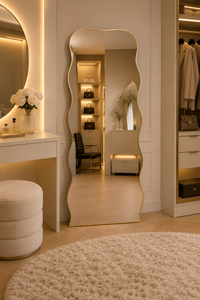 Wave sculptural wavy floor mirror leaning on wall — Bask Decor Pakistan