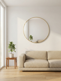 Orbit round wall mirror mounted in bedroom — Bask Decor Pakistan